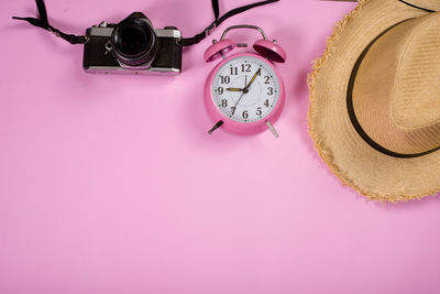 High angle view of clock on table