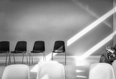 Low angle view of empty chairs