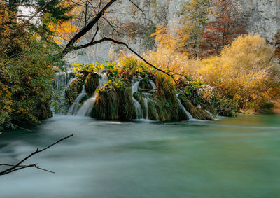 Long exposure photo of amazing waterfalls and cascades in autumn