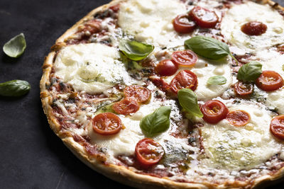 High angle view of pizza on table