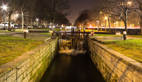 Illuminated street light at night