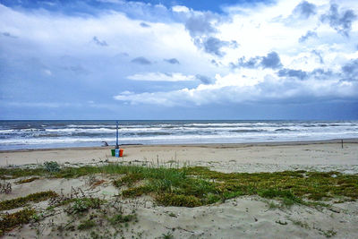 Scenic view of beach against sky