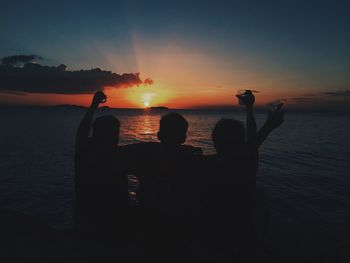 Scenic view of sea at sunset