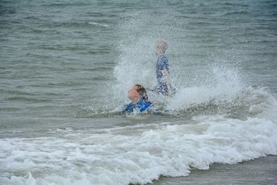 People enjoying in sea