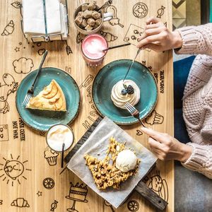 High angle view of coffee cup on table