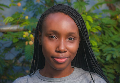 Close-up portrait of a smiling young woman