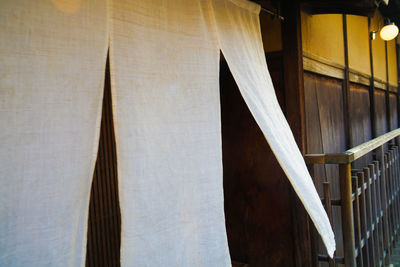 Low angle view of clothes drying on railing