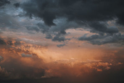 Low angle view of dramatic sky during sunset