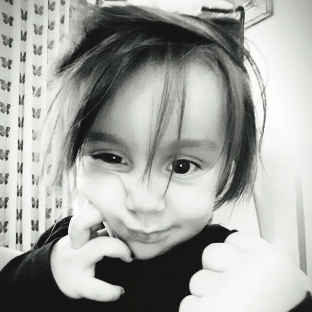 CLOSE-UP PORTRAIT OF SMILING GIRL WITH FACE IN BACKGROUND