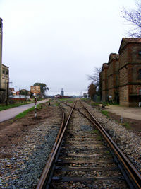 Railroad track against sky