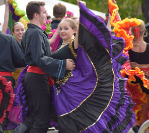 People dancing in traditional clothing