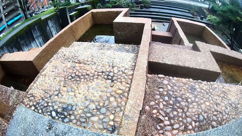 Close-up high angle view of cobblestone