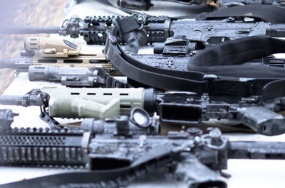 High angle view of guns on table