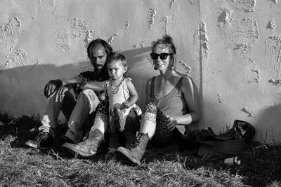 Portrait of friends sitting outdoors