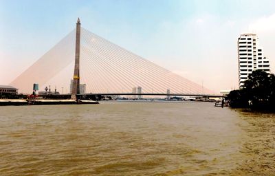 View of suspension bridge over river