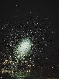 Close-up of water drops on glass