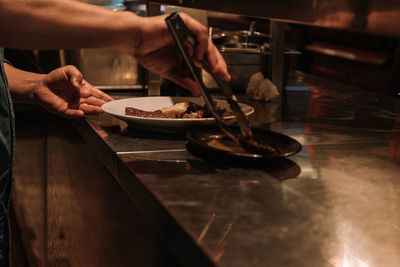 Man preparing food in kitchen