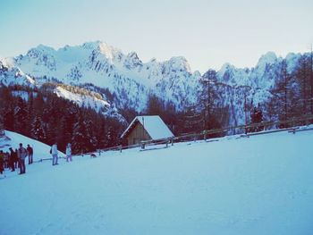 Scenic view of snow covered mountains