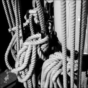 Close-up of tied rope in ship