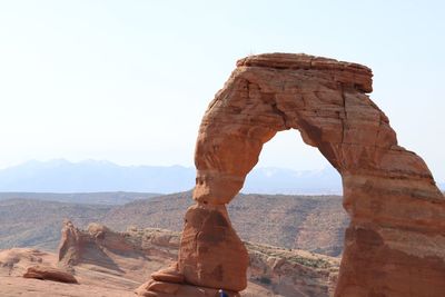 Scenic view of delicate arch at arches national park against sky