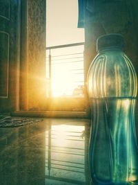 Close-up of glass bottle on table