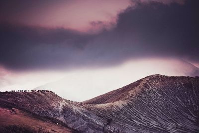 Low angle view of mountain against sky during sunset