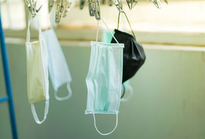 Close-up of clothes hanging on clothesline