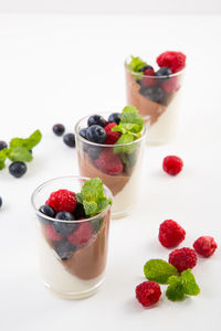 Close-up of fruit salad on white background