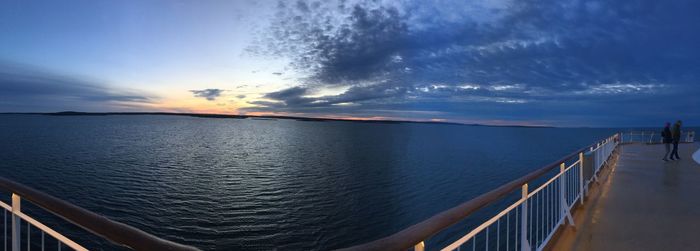 Panoramic view of sea against sky at sunset