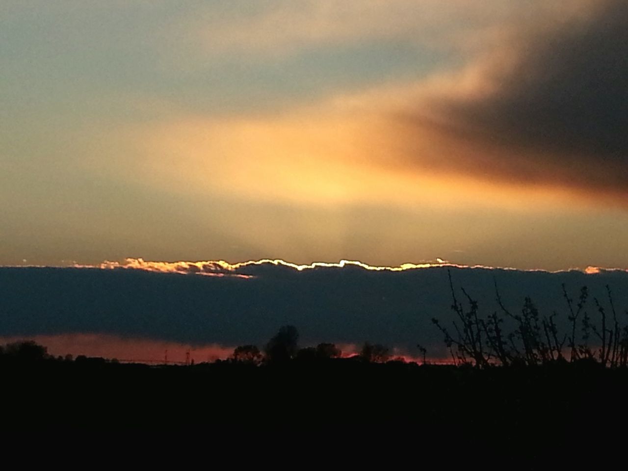 scenics, sky, sunset, tranquil scene, beauty in nature, tranquility, landscape, silhouette, nature, cloud - sky, idyllic, dusk, dramatic sky, outdoors, atmospheric mood, cloud, weather, field, mountain, no people