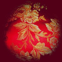 Close-up of flowers on paper