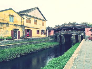 View of canal along buildings