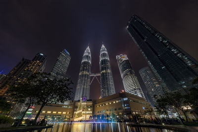 Low angle view of illuminated temple against sky at night