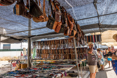 People at market stall