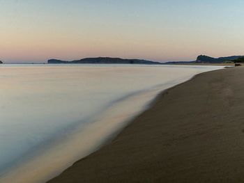 Scenic view of sea at sunset