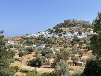 Scenic view of townscape against clear sky