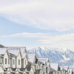 Buildings against sky during winter