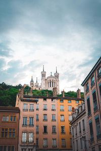 Low angle view of buildings against sky