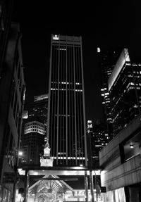 Low angle view of illuminated building at night