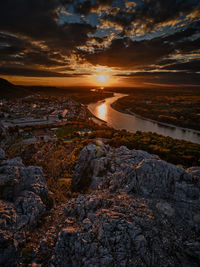 Hainburg city and danube river view from braunsberg mountain in sunset, austria