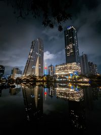 Illuminated buildings in city at night