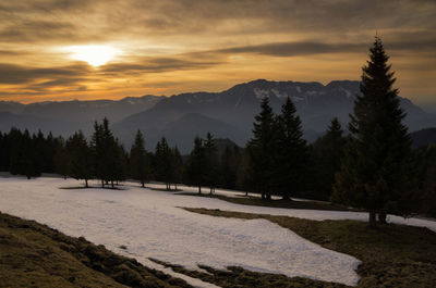 Scenic view of mountains against sky during sunset