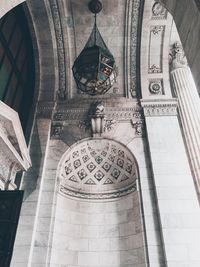 Low angle view of cross on building