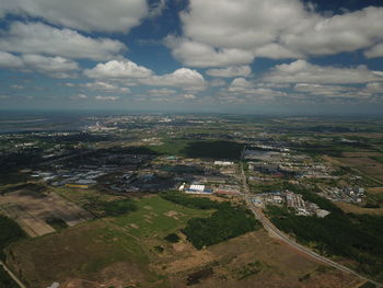 High angle view of buildings in city against sky