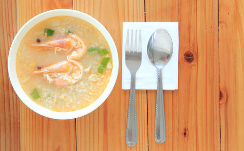 Directly above shot of soup served on table