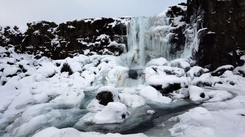 Gullfoss waterfall view in the canyon of the hvita river during winter snow in iceland.