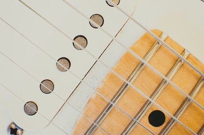 High angle close-up of guitar strings