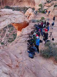 High angle view of people on rock formation