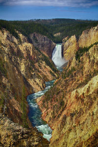 High angle view of river amidst mountains