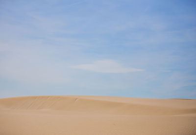 Scenic view of desert against sky